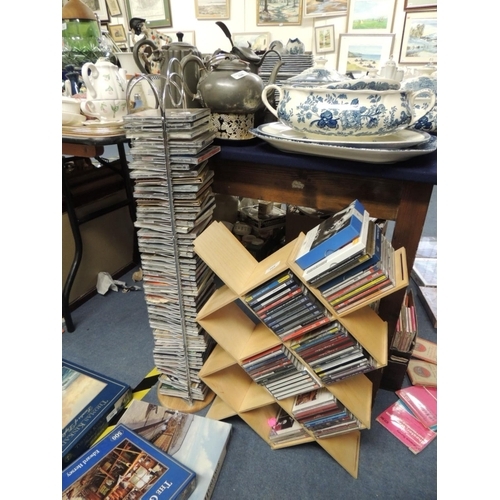105 - Metal framed CD tower; also a wooden framed CD tower containing mainly classical CDs
