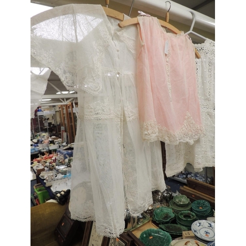 207 - Child's coloured and white linen clothing including lace blouses, a dress and silk christening gown ... 