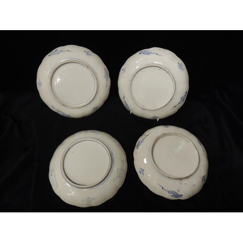 237 - Four Japanese blue and white plates