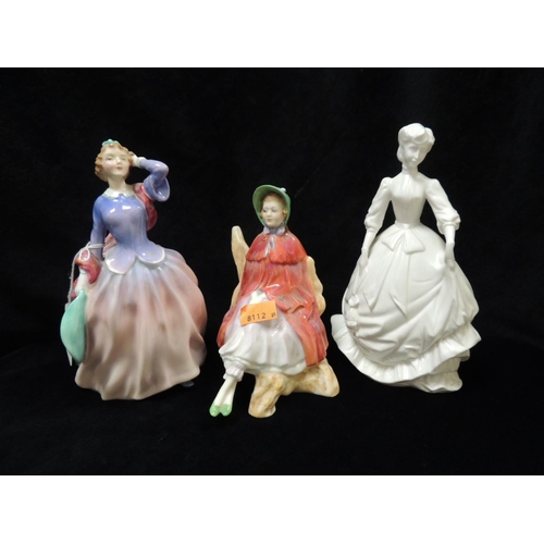 263 - Two Royal Doulton figurines 'Blythe Morning' and 'Sally'; also a Royal Worcester figurine 'Charity'