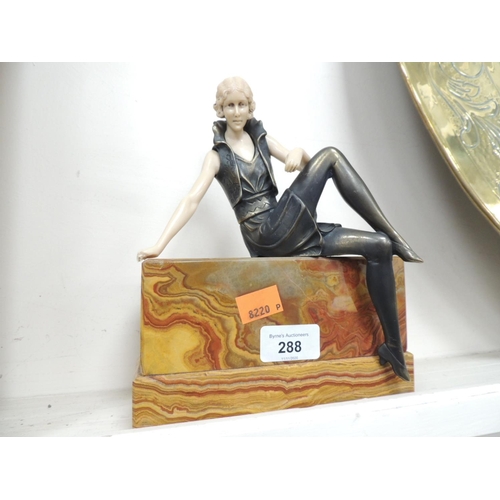 288 - Art Deco style bronze figurine seated on an onyx base (right hand fingers AF)