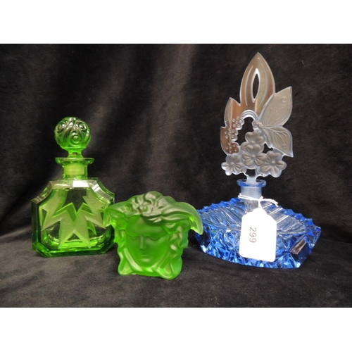 299 - Two Art Deco perfume bottles, one green glass and one blue glass; a Rosenthal Versace paperweight, b... 