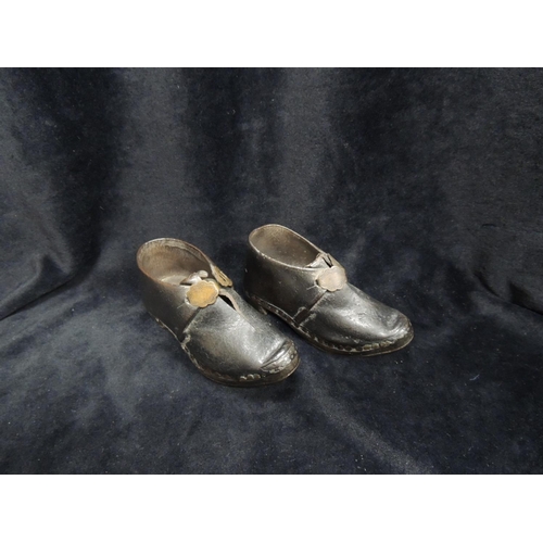 315 - Rare pair of Victorian infants leather and metal trimmed clogs with brass buckles