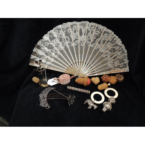 328 - Mixed lot including a Victorian lace and mother-of-pearl lady's fan, a metal formed moon phase hairs... 