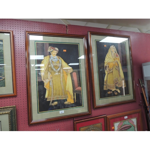 342 - Pair of identically framed prints depicting a traditional Indian wedding couple in gold coloured rob... 