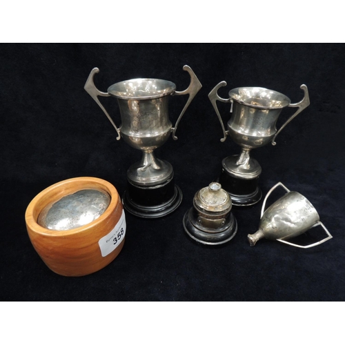 358 - Two small silver trophies, another small silver trophy (AF), a  silver lid etc