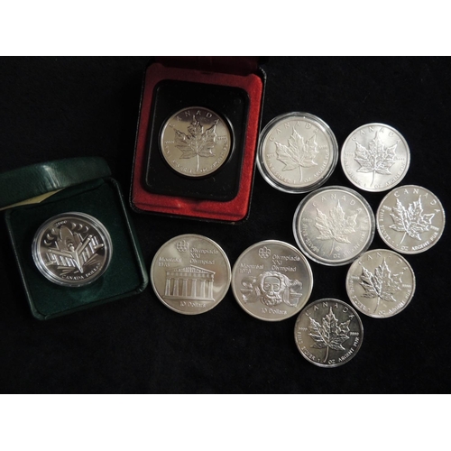 486 - Ten Canadian silver coins including Montreal Olympics commemoratives in five and ten dollar coins, t... 