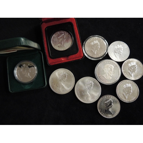 486 - Ten Canadian silver coins including Montreal Olympics commemoratives in five and ten dollar coins, t... 