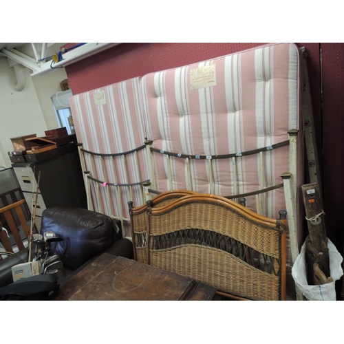 865 - Pair of Victorian cast iron and brass single beds, two bases and one mattress, and a pair of rattan ... 