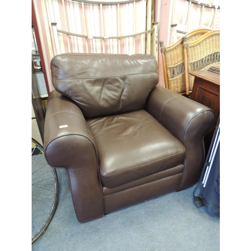 873 - Modern brown leather upholstered armchair