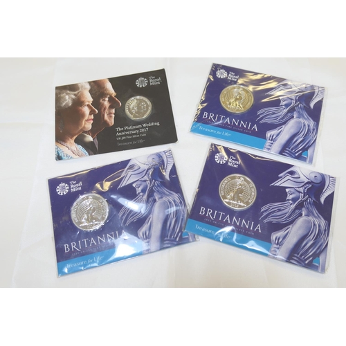 62 - Three Britannia £50 silver coins, in original sealed packs, each weighing 31g; also a Platinum Weddi... 