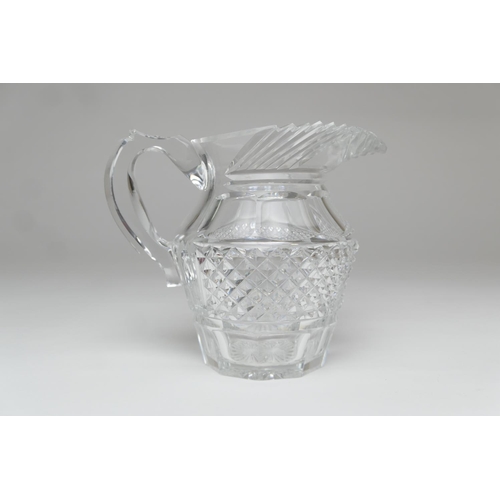 62 - Quality cut glass jug, slice and strawberry cut throughout, 15.5cm; also a quality cut glass footed ... 