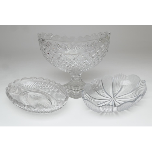 63 - Quality cut glass footed bowl, oval form with hobnail and fan cut border, raised on a stepped lozeng... 