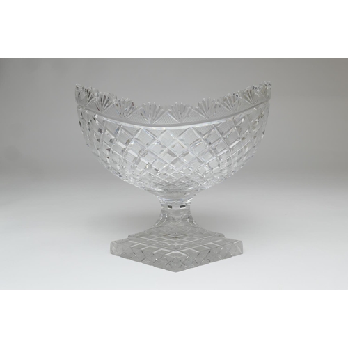 63 - Quality cut glass footed bowl, oval form with hobnail and fan cut border, raised on a stepped lozeng... 