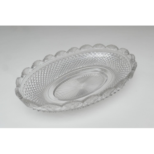 63 - Quality cut glass footed bowl, oval form with hobnail and fan cut border, raised on a stepped lozeng... 