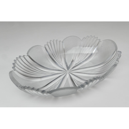 63 - Quality cut glass footed bowl, oval form with hobnail and fan cut border, raised on a stepped lozeng... 