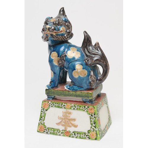 73 - Japanese kutani kylin, late 19th Century, decorated in famille verte colours over a plinth base, hei... 