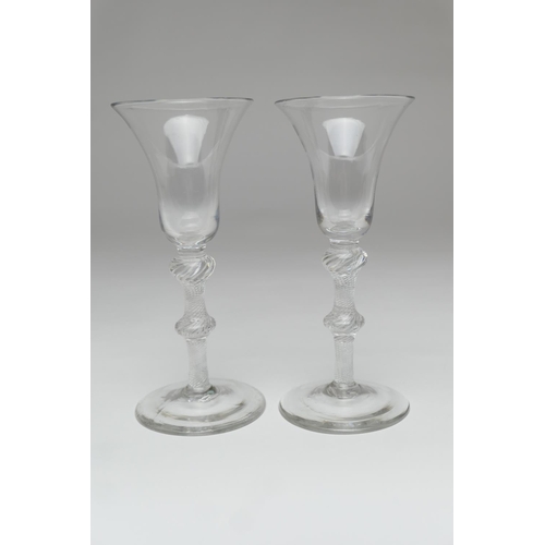 78 - Pair of George II air twist wine glasses, circa 1750, with bell bowl, double knopped multi strand ai... 