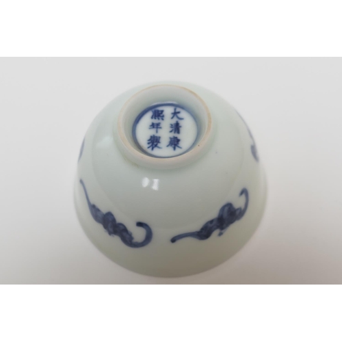 87 - Chinese porcelain tea bowl, decorated with flying bats in underglaze blue, painted Kangxi marks, 8cm... 