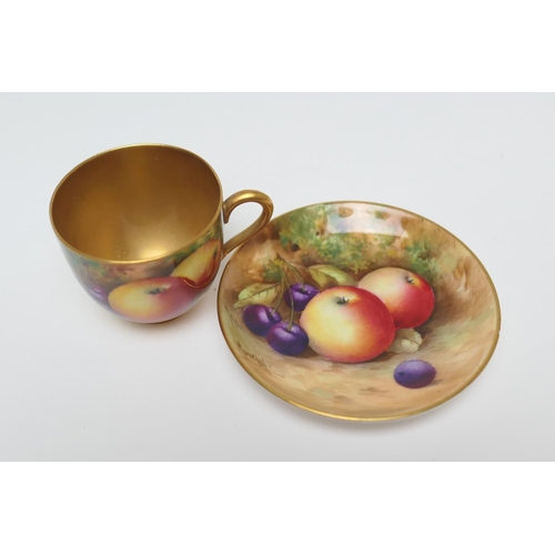 98 - Royal Worcester fruit decorated cabinet china, comprising a demi-tasse cup and saucer by Moseley, de... 