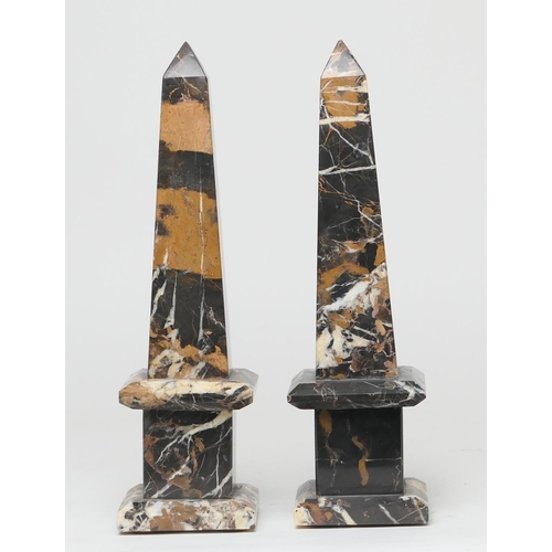 606 - Pair of coloured marble obelisks, height 37cm, 10.5cm at the base