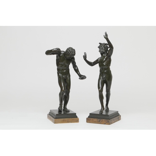 613 - After the Antique, a pair of Italian bronze Grand Tour figures of the Dancing Faun of Pompei and a t... 