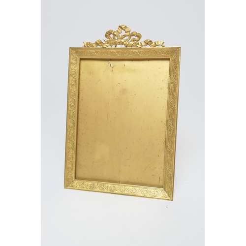 664 - French gilt ormolu photograph frame, circa 1900, rectangular form with ribbon surmount, interior siz... 