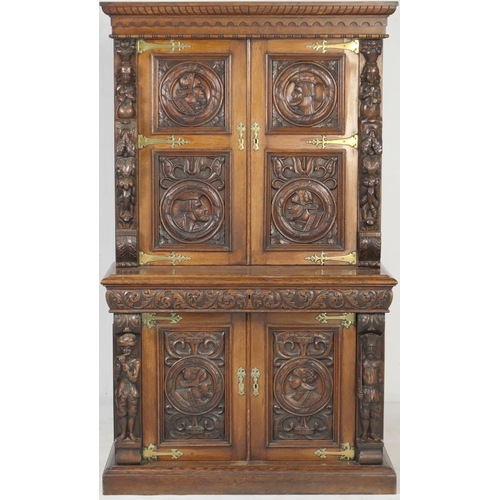 696 - Victorian Flemish carved oak cabinet, the upper part with two cupboard doors, each with carved doubl... 