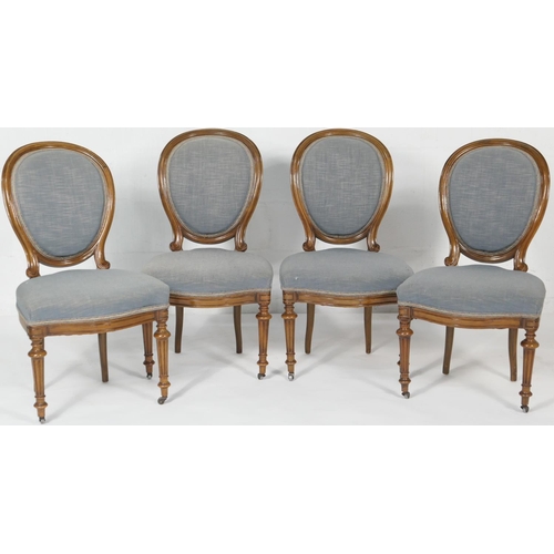 698 - Set of four Victorian walnut cameo back dining chairs, circa 1850, upholstered pad back and seat in ... 