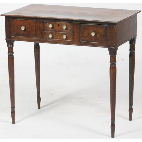 702 - Provincial oak side table, probably North Wales, circa 1810-30, two plank top over an unusual config... 