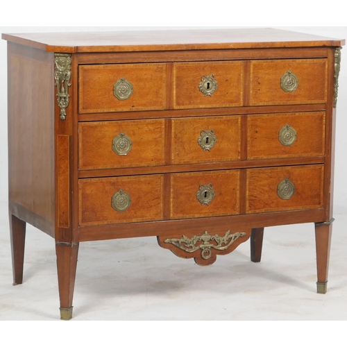 712 - French walnut and satinwood commode, 19th Century, the crossbanded satinwood top 
over three long dr... 