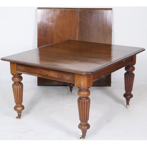 720 - Victorian mahogany extending dining table, circa 1870-90, the top pulling out to accommodate two add... 