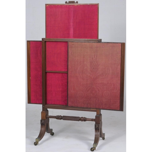 782 - Regency mahogany firescreen, having two fabric side pull panels and a top pull panel, raised on sabr... 