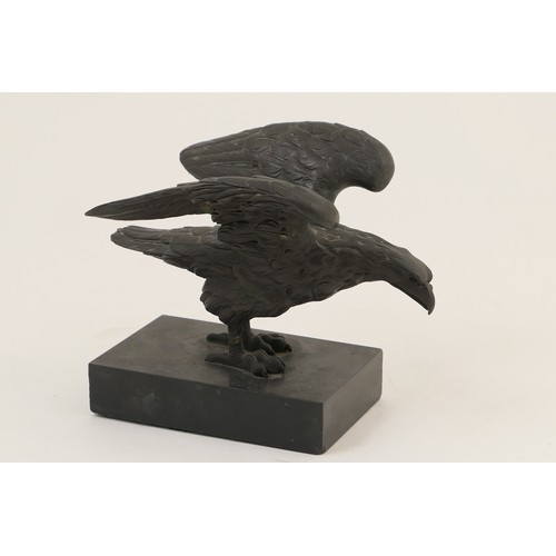 607 - Continental bronze eagle desk weight, circa 1900, cast with wings outspread, mounted on a rectangula... 