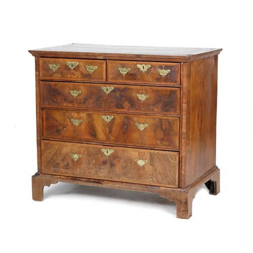 681 - George I walnut chest of drawers, early 18th Century with later additions, having a quarter veneered... 