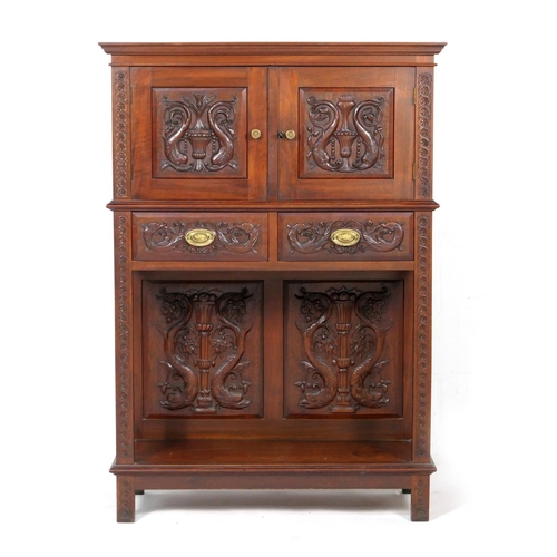 685 - Continental carved mahogany marriage cabinet on stand, late 19th Century, having two upper cupboard ... 