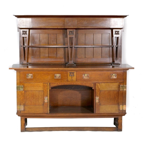 689 - Arts & Crafts oak sideboard, attributed to Liberty & Co., circa 1900-05, the tongue and groove panel... 