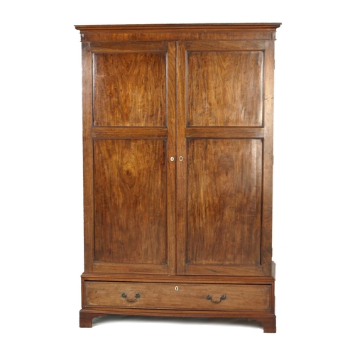 695 - Late George III mahogany press wardrobe, circa 1800-20, moulded cornice over two double recessed pan... 