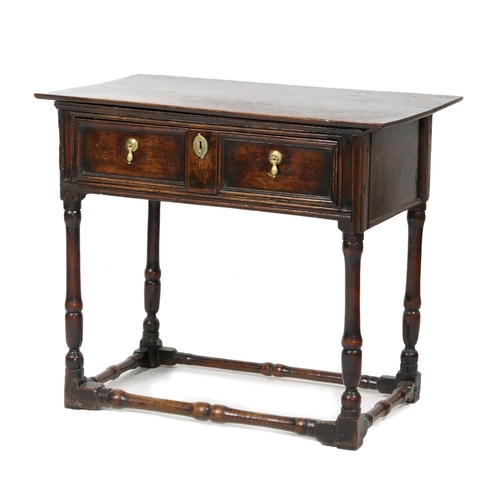 704 - Charles II oak joined side table, circa 1680, the two plank top over a single long drawer with doubl... 