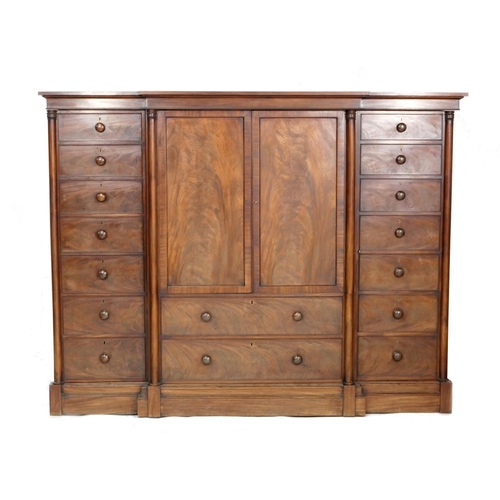 744 - William IV mahogany breakfront press cupboard, circa 1835, centred with two flame mahogany panel doo... 