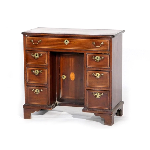 745 - George III mahogany and inlaid kneehole desk, circa 1800 and later, the top with satinwood and harew... 