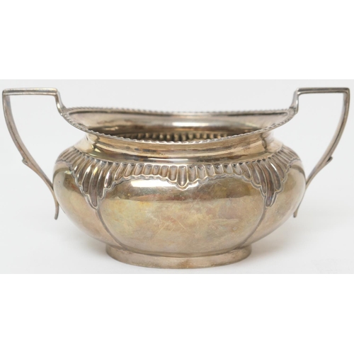 162 - Silver sugar basin, Sheffield 1898, oval melon shape with gadrooned border, fluted at the shoulders,... 