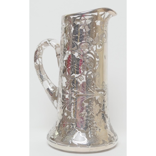 164 - Venetian silver overlaid glass water jug, circa 1900, tapered cylinder form encased with fruiting vi... 