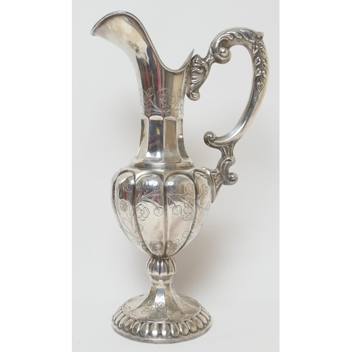 174 - White metal wine ewer, modern, slender form with shallow lobed baluster body over a trumpet foot, wi... 