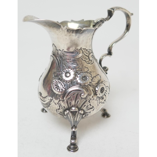 180 - George II silver cream jug, maker's mark indistinct, London 1751, baluster form with acanthus capped... 