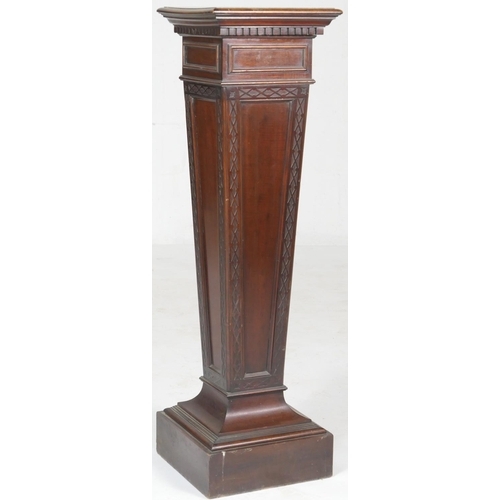 787 - Edwardian mahogany torchere, in Chippendale Revival style, square top over a tapered blind fretwork ... 