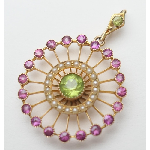 379 - Attractive Edwardian gem set pendant, circular form centred with a round cut peridot bordered with a... 