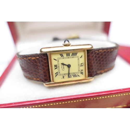 384 - Cartier 'Must' lady's silver gilt quartz wristwatch, circa 1981, 14mm dial with sapphire cabochon wi... 