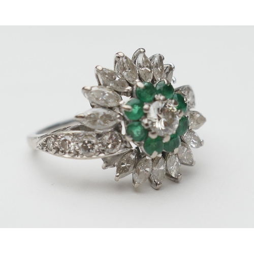 432 - Emerald and diamond cluster ring, central round brilliant cut diamond of approx. 0.25ct, bordered wi... 