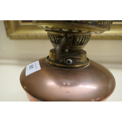 661 - W.A.S. Benson, brass and copper oil lamp, with a frosted spherical shade, copper tank over a brass t... 